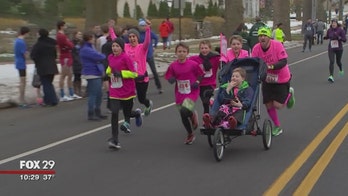 Principal helps 10-year-old with special needs complete 5K