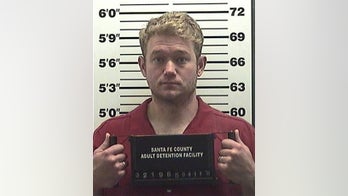 Paramedic accused of spending $11,000 with dead man's debit card