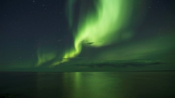 Northern lights shine over Michigan's Mackinac Bridge