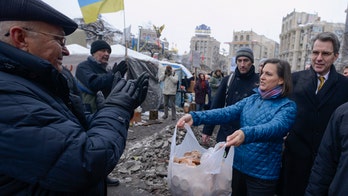 Ukraine leader 'intends to sign' EU deal after protests