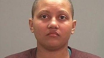 Woman says wrestling 'sleeper hold' led to wife's death, officials say