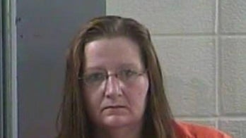 Kentucky woman lights husband on fire after seeing him talk to another woman, cops say