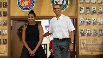 Obama thanks troops in yearly visit, calls service members on Christmas