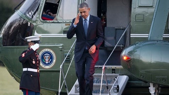 Obama signs $1.1 trillion spending bill into law