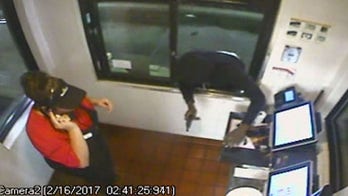Robber jumps through McDonald's window