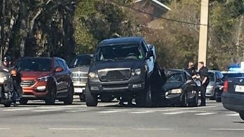 Pickup crushes car in Florida road rage case