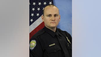 North Carolina officer shot multiple times, dragged during traffic stop