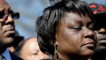 White officer won't face charges for shooting black NC man in self-defense