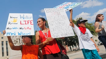 Judge grants partial stop on North Dakota pipeline work