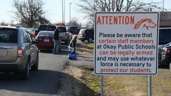 Some Oklahoma schools display signs warning staffers could be armed
