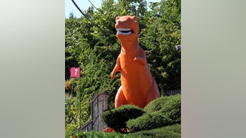 Orange dinosaur at Massachusetts mini golf course saved from extinction
