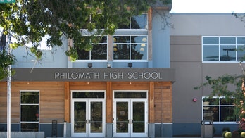 11 freshmen victims in alleged Oregon hazing, coach charged