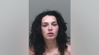 Oregon mom arrested for towing 3 kids in a red wagon behind her car, cops say