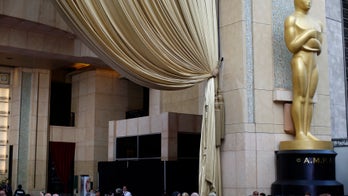 Street artist installs cocaine-snorting Oscar statue