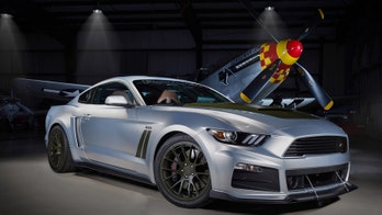 Roush P-51 Ford Mustang is ready for a dogfight with a Hellcat