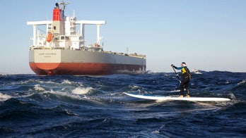 Surfer becomes first person to cross Atlantic Ocean on paddleboard