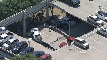 Texas parking garage partially collapses, crushing cars