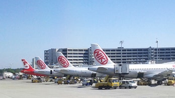 Economy flier arrested for using business class bathroom