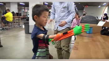 Student creates 3-D printed arm for professor's son