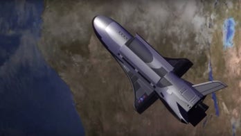 Secretive X-37B military space plane wings past 200 days in orbit