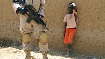 Darfur desert sands bear witness to a troubled region