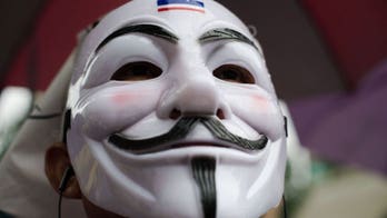 Thailand 'white mask' protesters rally in Bangkok