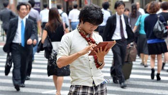 In Asia, ancient writing collides with the digital age