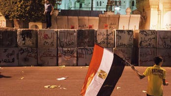 Showdown looms as Egypt's Morsi marks first year