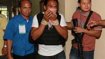 Backhoe man describes Philippine massacre burial