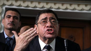 Egypt court orders back prosecutor sacked by Morsi