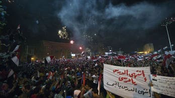Egypt protesters erupt in joy as army ousts Morsi