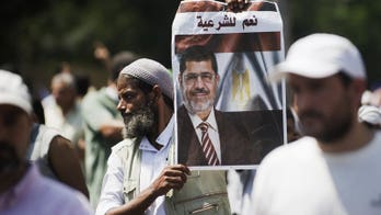 Gunfire as Morsi backers march on Egypt military HQ