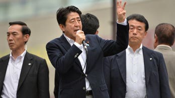 Japan PM Abe set to win upper house majority: polls