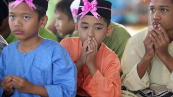 Malaysia withdraws controversial one-parent conversion law