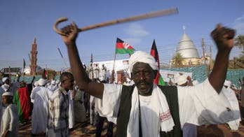 Year on, Sudan demos fade but threats intensify