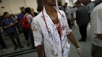 Emotions run wild at scene of Egypt 'massacre'