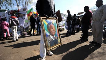 Mandela 'continues to respond to treatment'