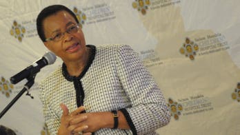 Mandela's wife says now 'less anxious' about his health