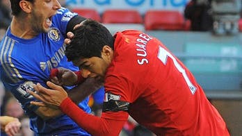 Wenger tight-lipped over Suarez bid