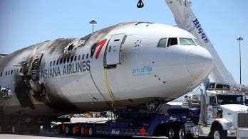 Pilots of crashed Asiana plane return to S. Korea