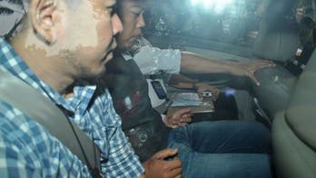 Singapore policeman charged over double murder