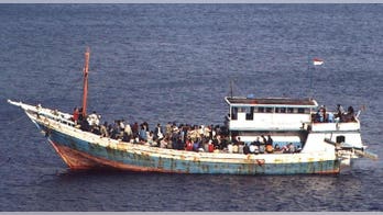 Boat with 150 asylum-seekers capsizes off Australia