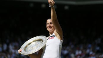 Wimbledon champ Bartoli to play Hopman Cup