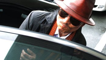 Japan woman sues yakuza boss over protection money