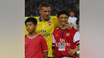 Vietnam 'Running Man' says off to Arsenal
