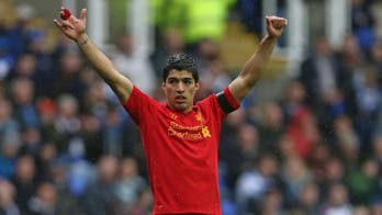 Liverpool manager Rodgers expects Suarez to stay