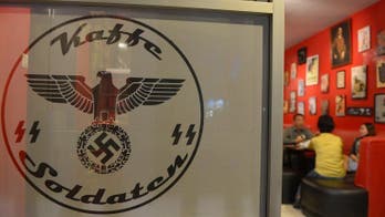 Nazi-themed cafe in Indonesia to ditch swastikas