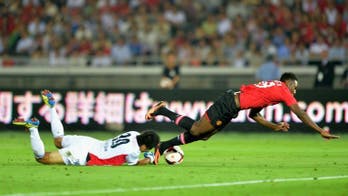 Moyes's United humbled in Japan