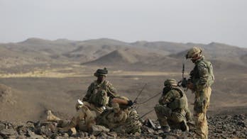 Keen to withdraw, France pushed hard for poll in Mali