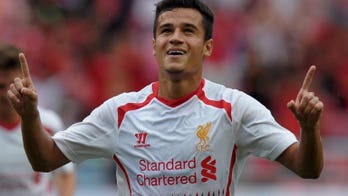 Coutinho outshines Suarez in Liverpool win